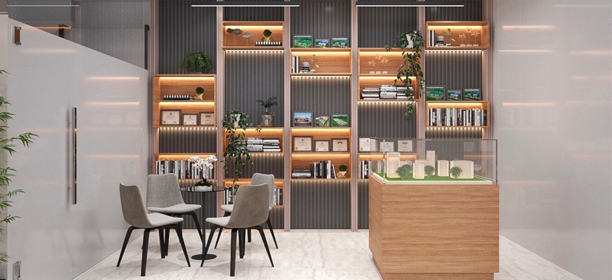 Khu vực giao dịch với khách hàng bố trí gon gàng, tiếp nối đó là kệ trưng bày những thành tích, huy chương của công ty với kiểu dáng thu hút.